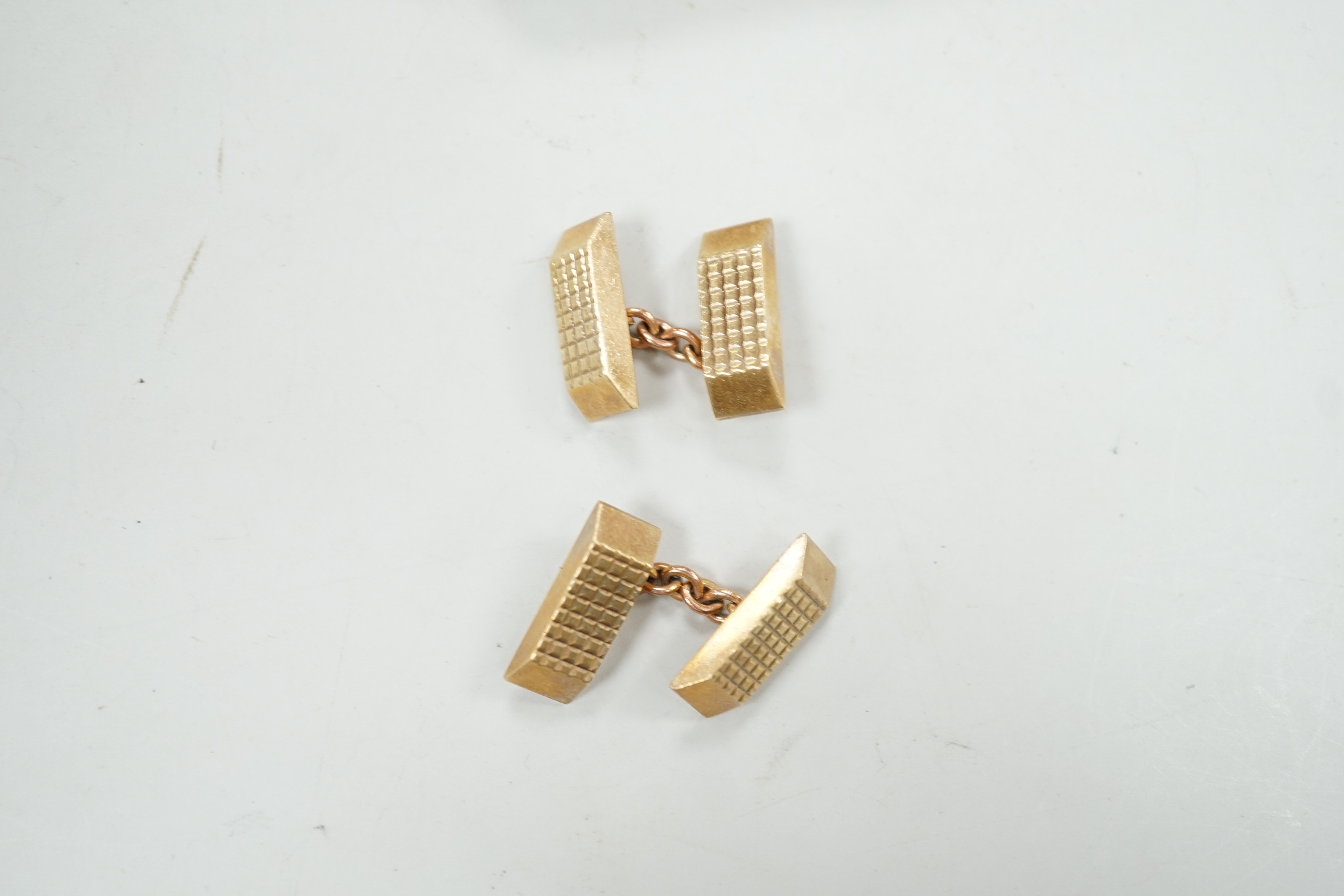 A pair of 9ct gold shaped rectangular cuff links, 19mm, 18.9 grams.